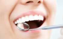 Белое пятно на десне