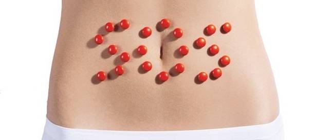 болит живот